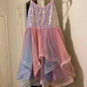 Dillards Girls elegant dress, worn twice , very pretty sequins, pink and purple